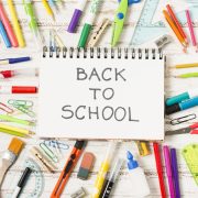 notepad-back-school-surrounded-by-school-supplies